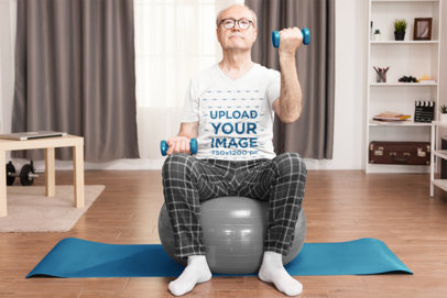 V-Neck Tee Mockup Featuring a Senior Man Exercising at Home