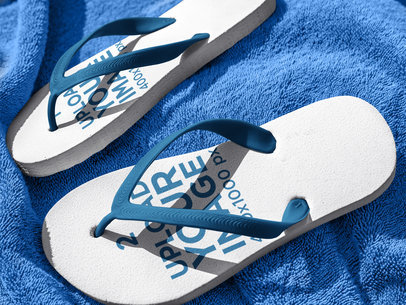 Flip Flops Mockup Lying on a Blue Towel a15439