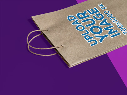 Angled Mockup of a Paper Bag Lying on a Bicolor Surface a15303