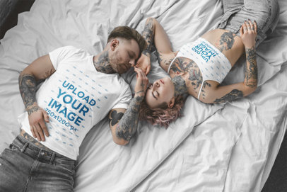 T-Shirt and Sports Bra Mockup of a Tattooed Couple Taking a Nap