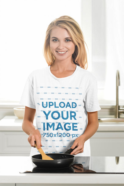 T-Shirt Mockup of a Woman Making Breakfast in Her Kitchen