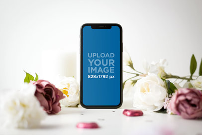 Mockup of an iPhone 11 Surrounded by Valentine's Day Roses 5148-r-el1