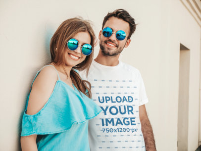 T-Shirt Mockup of a Couple Wearing Matching Sunglasses