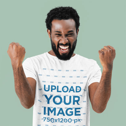 T-Shirt Mockup Featuring a Happy Bearded Man Celebrating