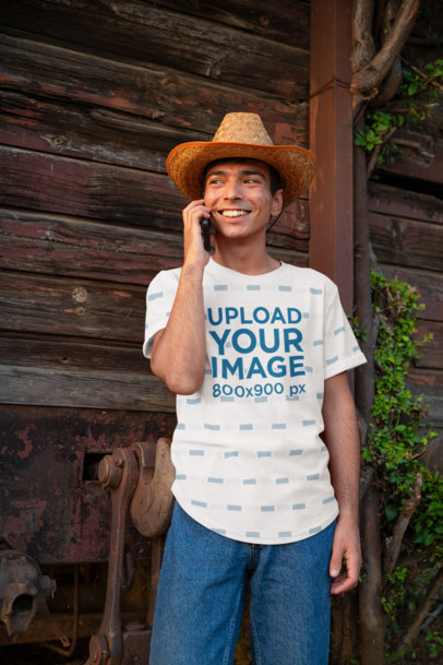 Sublimated Tee Mockup of a Happy Young Man on the Phone 