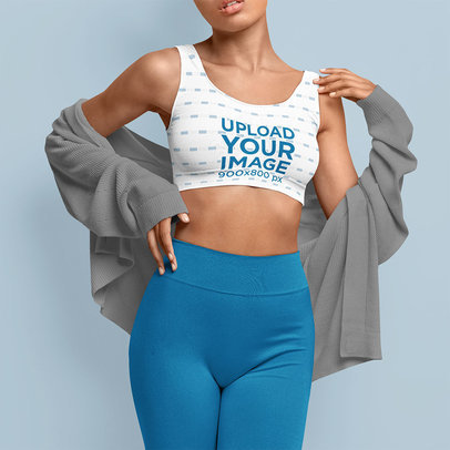 Sports Bra Mockup Featuring a Woman Posing in a Studio