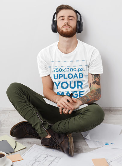 T-Shirt Mockup of a Tattooed Man Listening to Music While Working m2902-r-el2