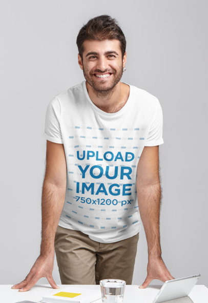 T-Shirt Mockup of a Man in a Casual Business Setting