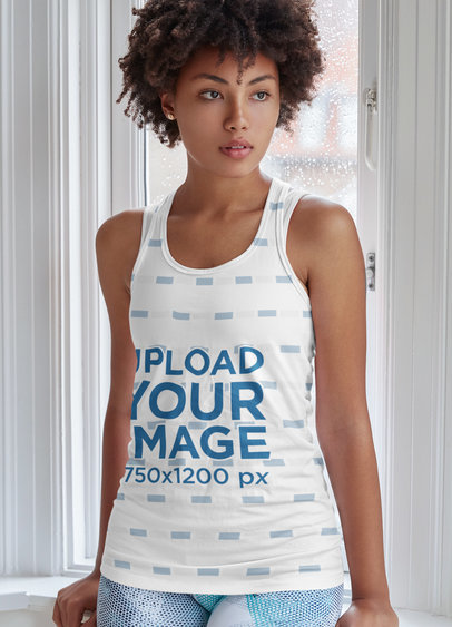 Mockup of a Woman Wearing a Tank Top on a Rainy Day