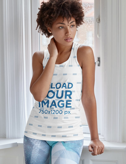 Tank Top Mockup of a Woman Posing by a Window