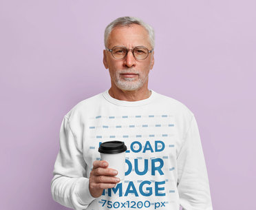 Sweatshirt Mockup Featuring a Serious Man With Glasses in a Studio