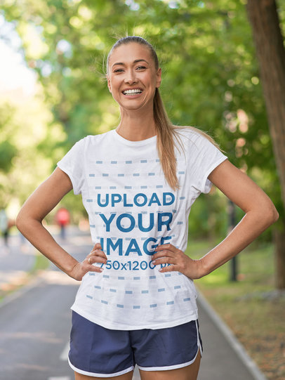 Activewear Mockup Featuring a Joyful Woman Wearing a T-Shirt at a Park m4019-r-el2