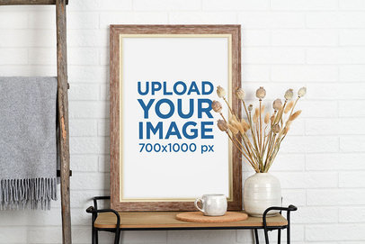 Mockup of a Vertical Art Print Placed by Home Decor Items