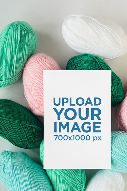 Mockup of a Vertical Flyer Placed over Colorful Cotton Yarns m3812-r-el2