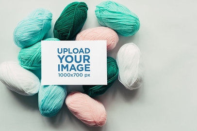 Mockup of a Horizontal Flyer Placed over Cotton Yarns m3809-r-el2