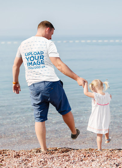 Back-View Tee Mockup of a Father Walking with Her Little Daughter
