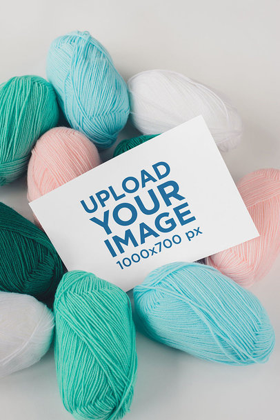 Mockup of a Horizontal Flyer Among Some Linen Threads m3811-r-el2