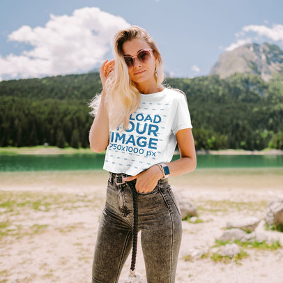 Crop Top Mockup of a Woman Posing by a Lake 
