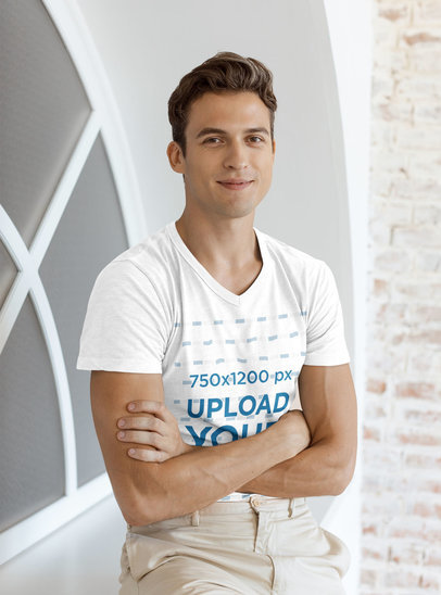 Heather V-Neck T-Shirt Mockup of a Young Man Crossing His Arms