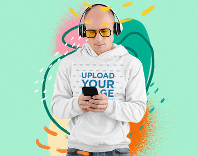 Hoodie Mockup of a Man Listening to Music with an Illustrated Backdrop