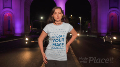 T-Shirt Video of a Woman Posing on a Street at Night