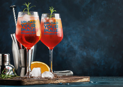 Mockup of Two Wine Glasses Filled with a Tropical Cocktail 