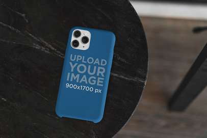 Mockup of a Phone Case Placed on a Stone Surface 
