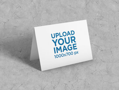 Greeting Card Mockup Featuring a Customizable Backdrop
