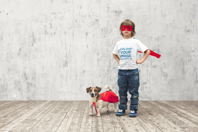 T-Shirt Mockup of a Little Boy and His Dog Playing to Be Superheroes