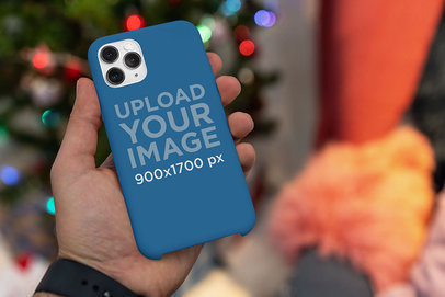Phone Case Mockup Featuring Christmas Lights in the Background 
