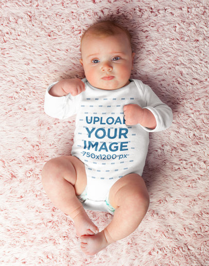 Onesie Mockup Featuring a Baby Laid Down over a Soft Surface
