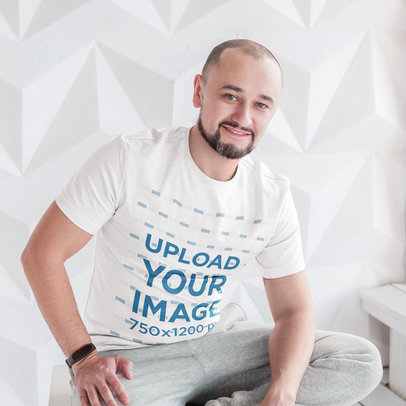 T-Shirt Mockup of a Middle-Aged Man Posing in Front of a White Background m3163-r-el2