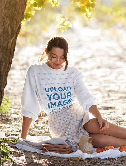 Sweatshirt Mockup of a Woman Posing Under a Tree
