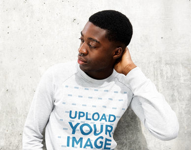 Mockup of a Serious Young Man Wearing a Heather Sweatshirt