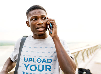 T-Shirt Mockup of a Worried Man Talking on the Phone M4337-r-el2