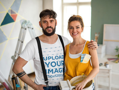 T-Shirt Mockup of a Man and His Girlfriend Painting Their House