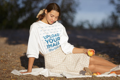 Sweatshirt Mockup of a Woman Having a Picnic by the Lake