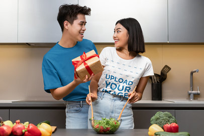 T-Shirt Mockup Featuring a Woman Celebrating With Her Boyfriend