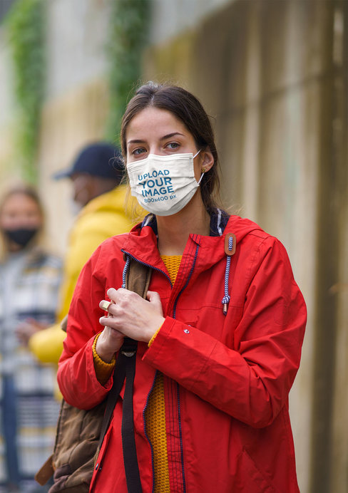Face Mask Mockup Featuring a Woman Wearing Waterproof Garments