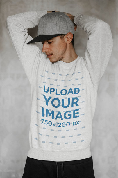 Heather Sweatshirt ​Mockup Featuring a Serious Man Posing Against a Concrete Wall m4892-r-el2