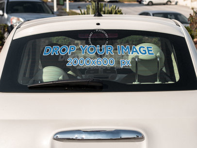 Car Window Decal Mockup on the Back Window of a White Car
