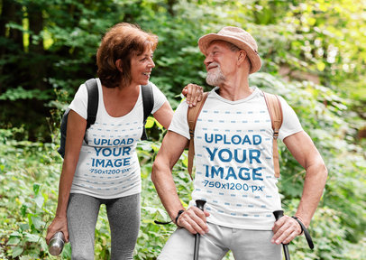 T-Shirt Mockup of a Senior Couple Hiking in the Woods
