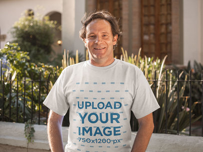 Mockup of a Middle Aged Man Wearing a Round Neck Tshirt While Outdoors