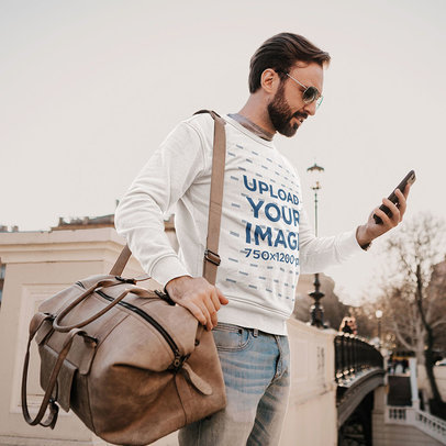 Sweatshirt Mockup of a Bearded Traveler Using His Smartphone m4236-r-el2