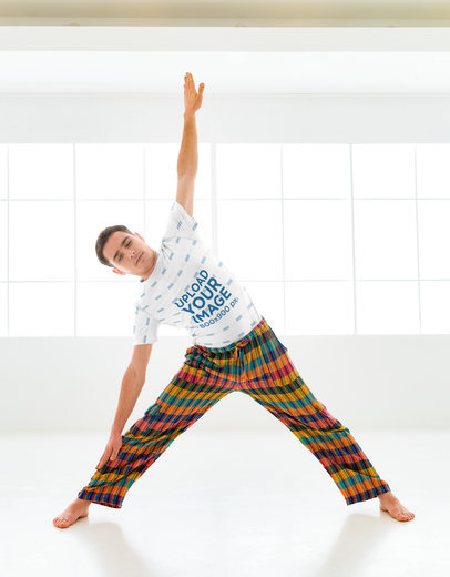 Sublimated T-Shirt Mockup of a Man with Colorful Pants Doing Yoga 38436-r-el2