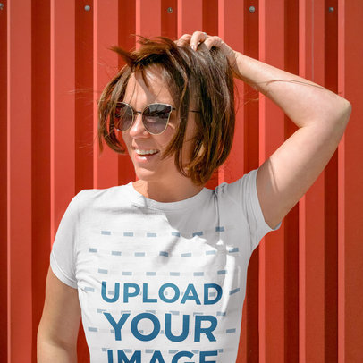 T-Shirt Mockup Featuring a Woman With Sunglasses Holding Up Her Hair m5096-r-el2