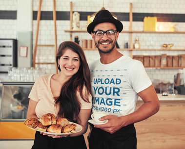 T-Shirt Mockup Featuring a Happy Man at a Coffee Shop 