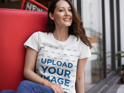 Woman Wearing a Round Neck T-Shirt Template While Sitting Down Outdoors