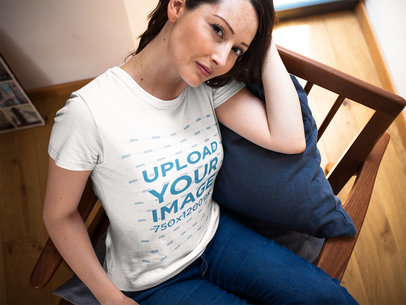 Hispanic Woman on a Chair Wearing a Tshirt Mockup