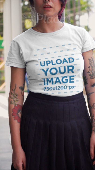 T-Shirt Video Featuring a Tattooed Woman Strolling Around the City 3121v